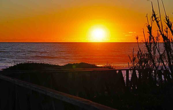 Romantic sunset at the beach in El Palmar Andalusia