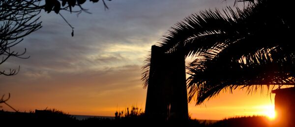 Sunset with view to the Torre in El Palmar in Andalusia