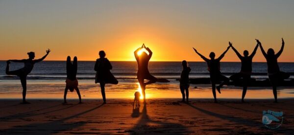 Yoga El Palmar at sunset by the sea