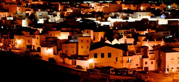 Village at night near the a frame surfcamp andalusia